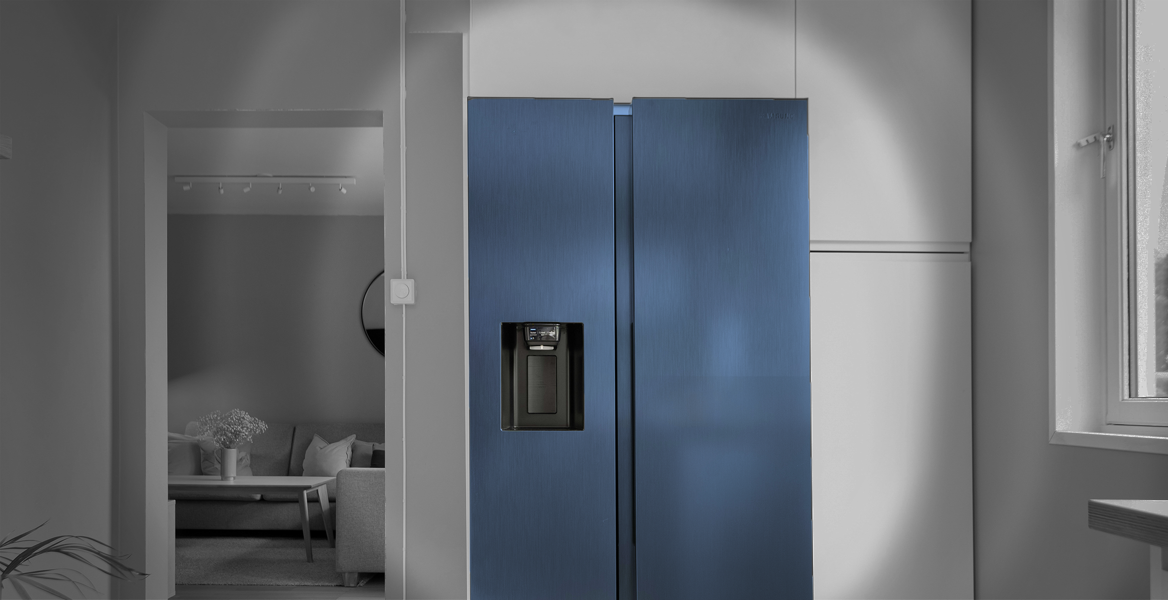 Image of a Kitchen with a blue fridge in the center